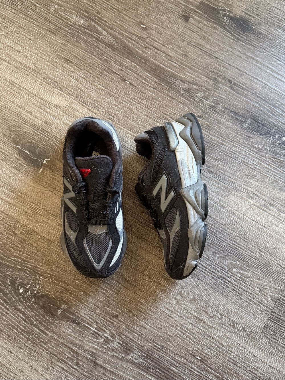 New Balance Kids Black and Gray Athletic Sneakers with Red Accent